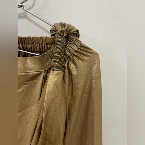 Stylish ready to wear designer saree with peplum black blouse and golden saree - Picture 8 of 9